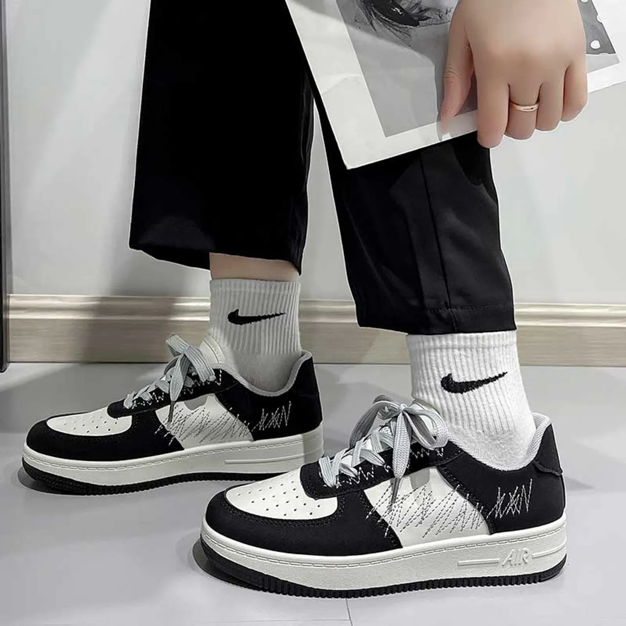 Black white casual sewn accents shoe sneaker