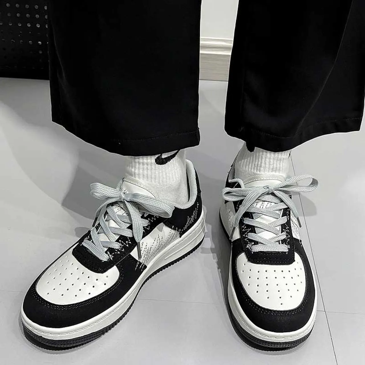 Black white casual sewn accents shoe sneaker