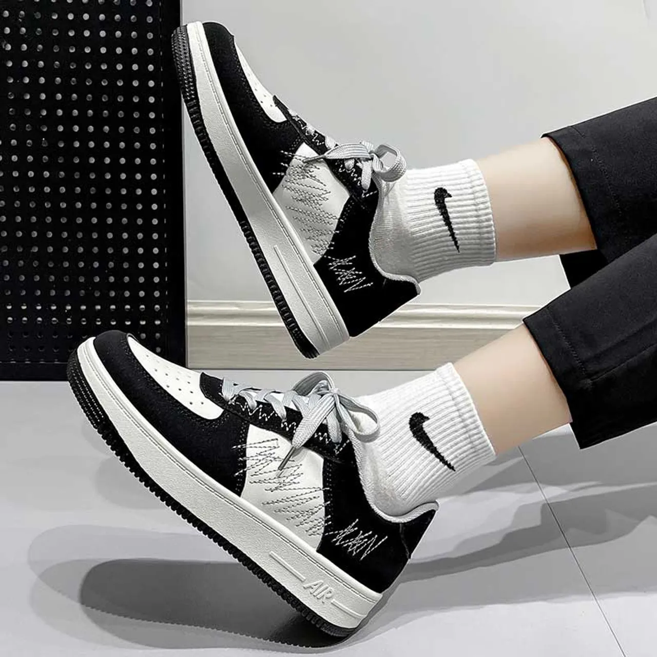 Black white casual sewn accents shoe sneaker